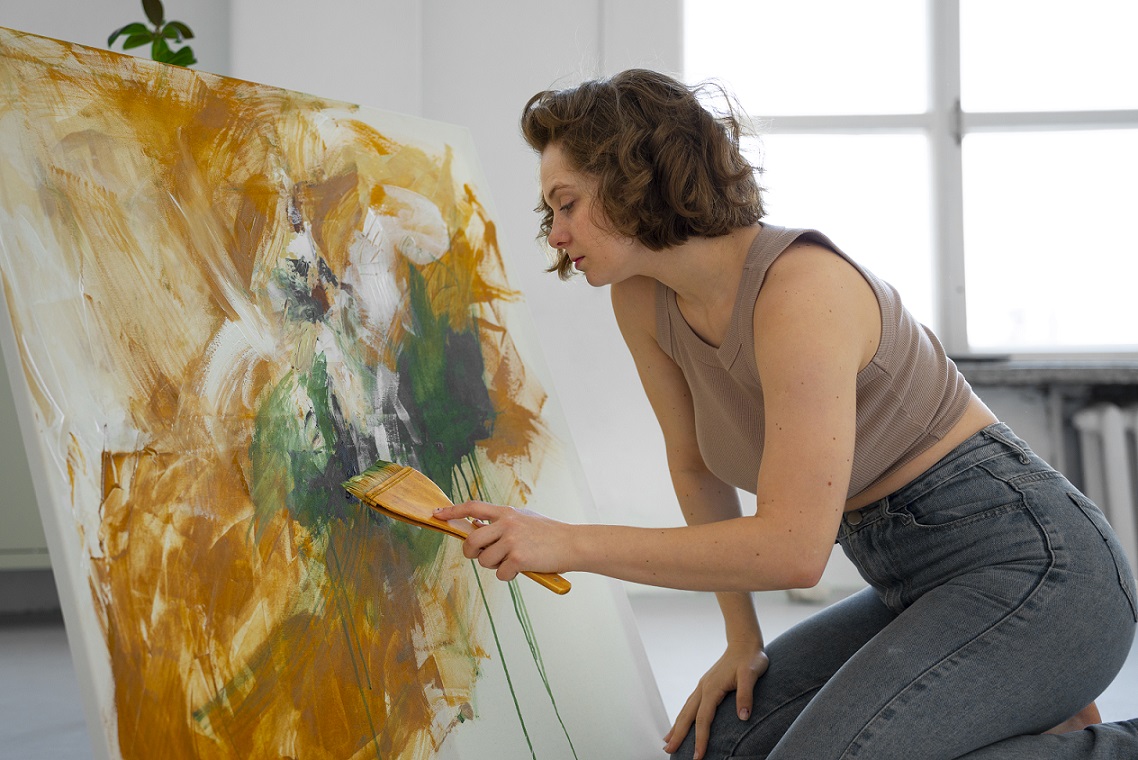 woman-painting-freepik Woman painting.