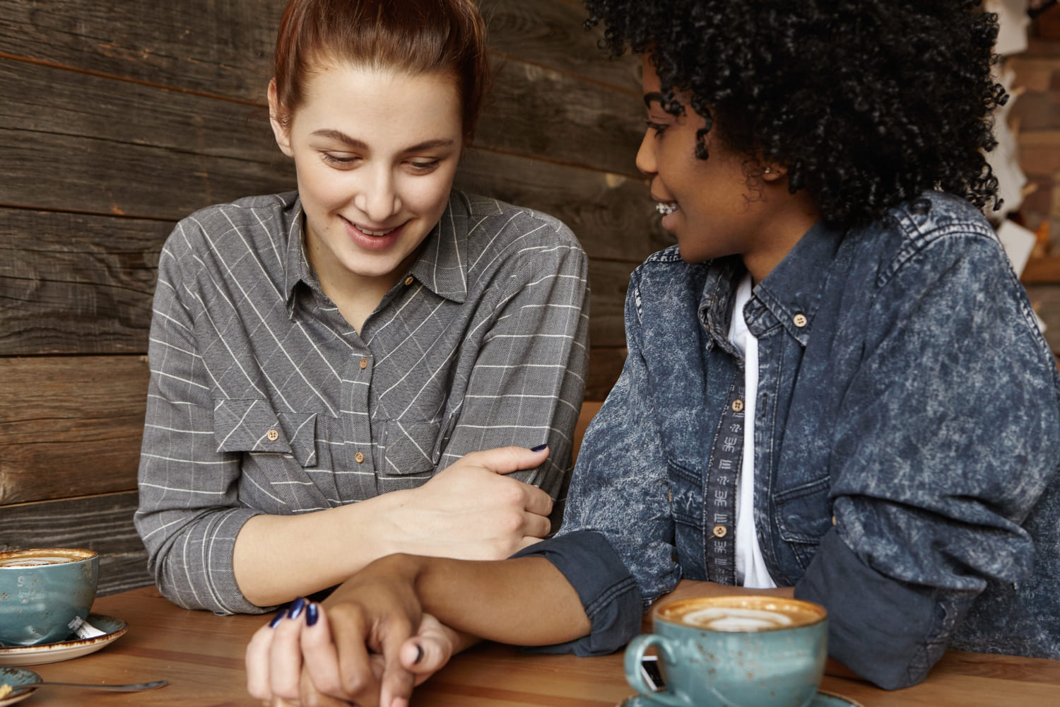 Trusted friend offering support for survivors of domestic violence in a safe setting