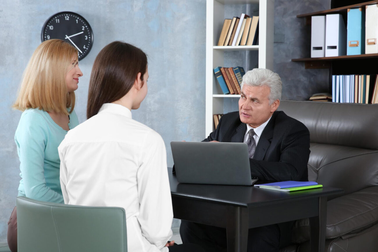 Advocate providing confidential domestic violence support in a private setting