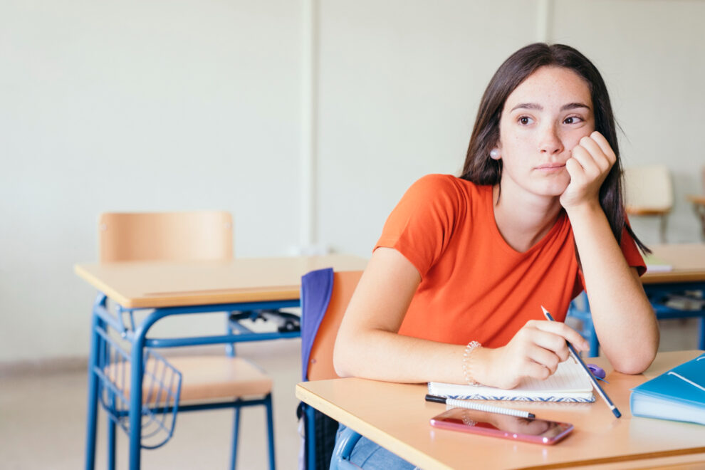 Teen experiencing domestic violence struggles with academic performance at school