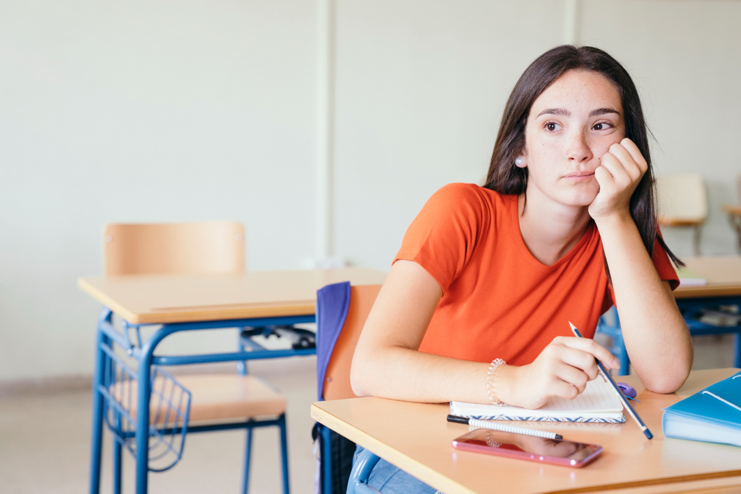 Teen experiencing domestic violence struggles with academic performance at school