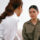 Advocate discussing intimidation tactics in abusive relationships with a survivor